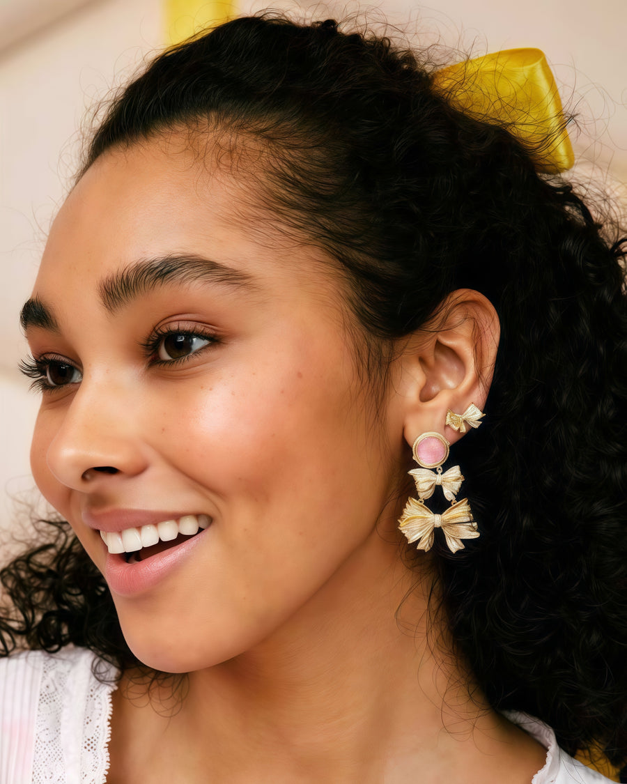 Aurora’s Embrace: The Golden Bow Princess Earrings