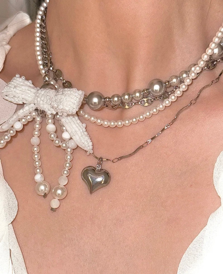 Chaos in Elegance: Titanium Pearl Quad-Choker